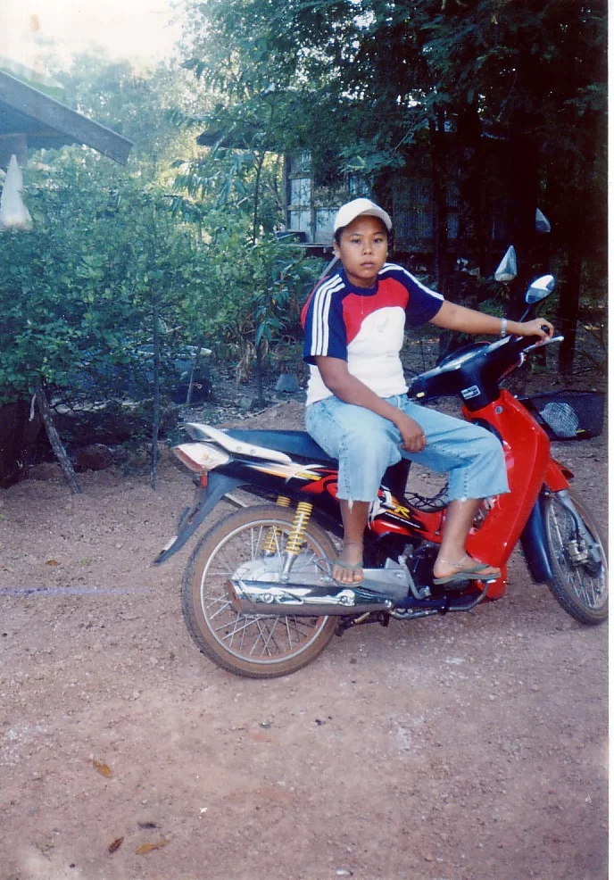 Em på motorbike.webp